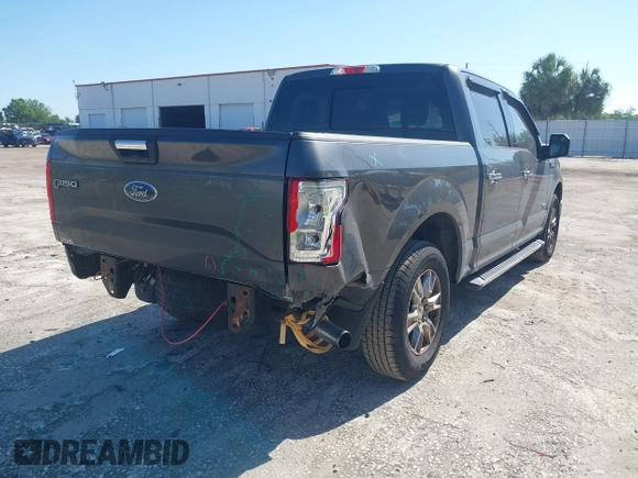 2015 Ford F-150 XL with VIN 1FTEW1CG2FFC70680, listed as a IAAI auction lot 41871782 with 143,875 mi miles. Bid and sale history available at carsss.com. Image 4.