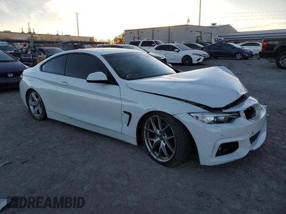 2015 BMW 4 Series 428i with VIN WBA3N3C58FK234842, listed as a Copart auction lot 86396484 with 101,559 mi miles and Salvage Title. Bid and sale history available at DreamBid. Image 4.