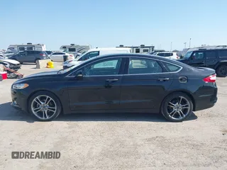 2016 Ford Fusion Titanium with VIN 3FA6P0D91GR237742, listed as a IAAI auction lot 41892627 with 73,616 mi miles and . Bid and sale history available at DreamBid. Image 14.