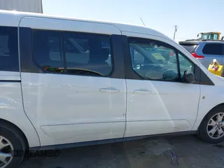 2014 Ford Transit Connect XLT z VIN NM0GE9F73E1142883, wystawiony jako IAAI lot #42574581 z przebiegiem 180 512 mil mil oraz . Historia ofert i sprzedaży dostępna na DreamBid. Obrazek 13.