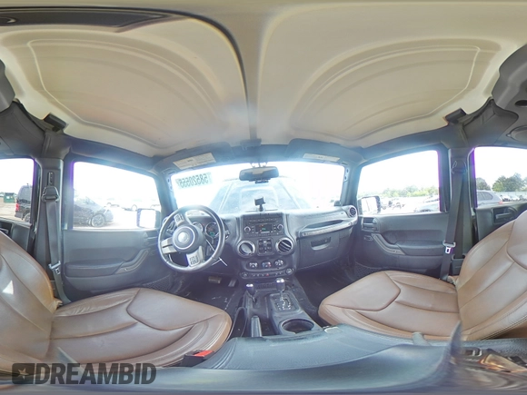2013 Jeep Wrangler Unlimited Sahara with VIN 1C4BJWEG8DL584909, listed as a Copart auction lot 58520555 with 91,633 mi miles and Salvage title. Bid and sale history available at DreamBid. Image 14.