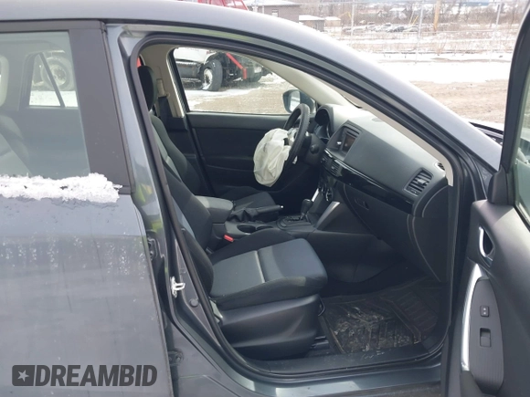 2013 Mazda CX-5 Sport z VIN JM3KE2BE9D0156274, wystawiony jako IAAI lot #41624466 z przebiegiem 159 017 mil mil oraz . Historia ofert i sprzedaży dostępna na DreamBid. Obrazek 5.