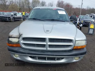 2003 Dodge Dakota Sport with VIN 1D7HG38X13S267227, listed as a IAAI auction lot 41952281 with 119,641 mi miles and . Bid and sale history available at carsss.com. Image 12.