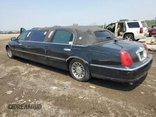 1999 Lincoln Town Car Executive with VIN 1L1FM81W8XY710157, listed as a Copart auction lot 59804965 with Not provided miles and Salvage title. Bid and sale history available at DreamBid. Image 2.