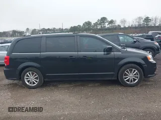 2019 Dodge Grand Caravan SXT with VIN 2C4RDGCG6KR749505, listed as a IAAI auction lot 42087083 with 167,551 mi miles and . Bid and sale history available at DreamBid. Image 13.