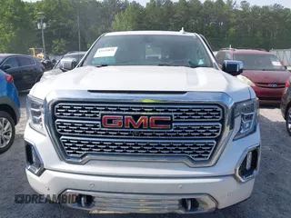 2020 GMC Sierra 1500 Denali z VIN 1GTU9FEL8LZ203683, wystawiony jako IAAI lot #42225894 z przebiegiem 42 577 mil mil oraz . Historia ofert i sprzedaży dostępna na DreamBid. Obrazek 12.