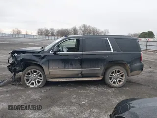 2016 GMC Yukon SLT with VIN 1GKS1BKC9GR480199, listed as a IAAI auction lot 41352032 with 146,716 mi miles. Bid and sale history available at carsss.com. Image 14.