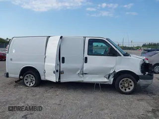 2014 Chevrolet Express Cargo Van with VIN 1GCSGAFX2E1121841, listed as a IAAI auction lot 42028712 with 164,768 mi miles. Bid and sale history available at carsss.com. Image 14.