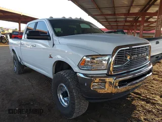 2016 Ram 2500 SLT with VIN 3C6UR5DLXGG227959, listed as a IAAI auction lot 42609927 with 186,337 mi miles and . Bid and sale history available at DreamBid. Image 1.