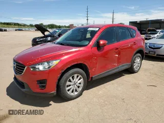 2016 Mazda CX-5 Sport with VIN JM3KE4BYXG0702655, listed as a Copart auction lot 63120205 with 64,403 mi miles and Salvage title. Bid and sale history available at DreamBid. Image 1.