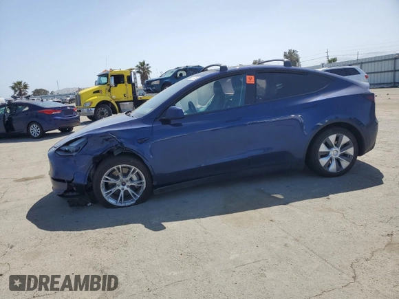 2023 Tesla Model Y Long Range with VIN 7SAYGAEE8PF927092, listed as a Copart auction lot 53917185 with 17,639 mi miles and Salvage Title. Bid and sale history available at DreamBid. Image 1.