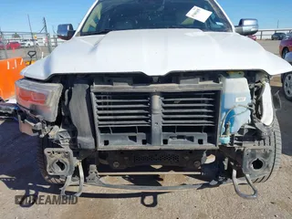 2020 Ram 1500 Limited with VIN 1C6SRFHT7LN258515, listed as a IAAI auction lot 41661635 with 125,699 mi miles and . Bid and sale history available at DreamBid. Image 6.