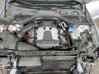 2014 Audi A6 Prestige z VIN WAUHGAFC1EN143102, wystawiony jako Copart lot #53692145 z przebiegiem 101 503 mil mil oraz Szkoda całkowita • Salvage title. Historia ofert i sprzedaży dostępna na DreamBid. Obrazek 11.
