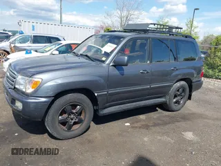 2003 Toyota Land Cruiser z VIN JTEHT05J932041288, wystawiony jako IAAI lot #42000615 z przebiegiem 166 159 mil mil oraz . Historia ofert i sprzedaży dostępna na DreamBid. Obrazek 14.