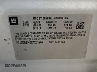 2012 Chevrolet Sonic LT with VIN 1G1JD5SH0C4231267, listed as a Copart auction lot 82848544 with 115,159 mi miles and Salvage title. Bid and sale history available at DreamBid. Image 14.