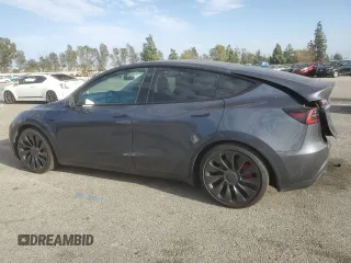2022 Tesla Model Y Performance with VIN 7SAYGDEF3NF490643, listed as a Copart auction lot 46975825 with 50,792 mi miles and Salvage Title. Bid and sale history available at DreamBid. Image 2.