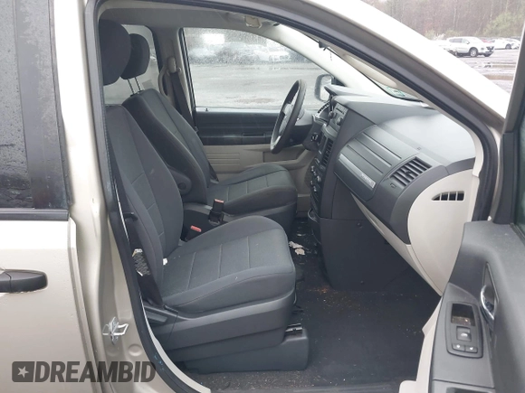 2008 Dodge Grand Caravan SE with VIN 1D8HN44H28B173855, listed as a IAAI auction lot 41968151 with 127,183 mi miles and . Bid and sale history available at DreamBid. Image 5.