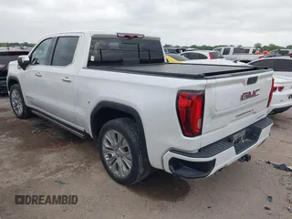 2022 GMC Sierra 1500 Denali with VIN 3GTU9FELXNG127029, listed as a IAAI auction lot 42062882 with 24,082 mi miles and . Bid and sale history available at DreamBid. Image 3.