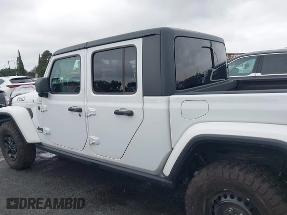 2022 Jeep Gladiator Willys with VIN 1C6HJTAG1NL148524, listed as a IAAI auction lot 41507693 with 42,004 mi miles and . Bid and sale history available at DreamBid. Image 14.