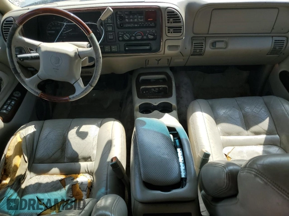 1999 Cadillac Escalade z VIN 1GYEK13RXXR408201, wystawiony jako Copart lot #53805845 z przebiegiem 268 205 mil mil oraz Szkoda całkowita • Salvage title. Historia ofert i sprzedaży dostępna na DreamBid. Obrazek 8.