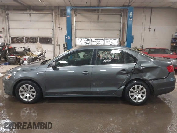 2014 Volkswagen Jetta TDI w/Premium with VIN 3VWLL7AJ4EM425825, listed as a IAAI auction lot 41519621 with 154,486 mi miles and . Bid and sale history available at DreamBid. Image 14.