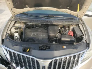 2011 Lincoln MKX z VIN 2LMDJ6JK1BBJ20361, wystawiony jako Copart lot #55584515 z przebiegiem 112 816 mil mil oraz Szkoda całkowita • Salvage title. Historia ofert i sprzedaży dostępna na DreamBid. Obrazek 12.