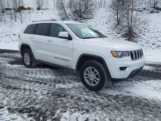 2019 Jeep Grand Cherokee Laredo E with VIN 1C4RJFAG9KC591515, listed as a IAAI auction lot 41559856 with 54,476 mi miles. Bid and sale history available at carsss.com. Image 1.