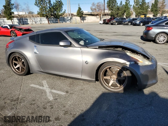 2009 Nissan 370Z Touring with VIN JN1AZ44E79M401576, listed as a Copart auction lot 89177535 with 131,622 mi miles and Salvage Title. Bid and sale history available at carsss.com. Image 4.