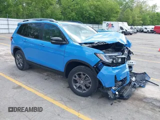 2024 Honda Passport TrailSport z VIN 5FNYF8H63RB008892, wystawiony jako IAAI lot #42260997 z przebiegiem 20 551 mil mil oraz . Historia ofert i sprzedaży dostępna na DreamBid. Obrazek 1.