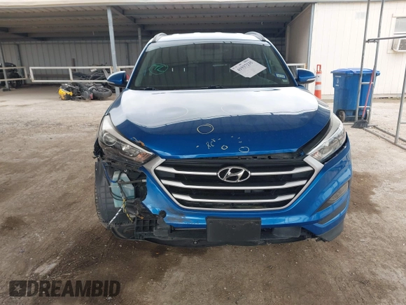 2018 Hyundai Tucson Sport with VIN KM8J33AL0JU803368, listed as a IAAI auction lot 41937235 with 64,163 mi miles and . Bid and sale history available at DreamBid. Image 13.