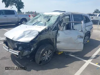 2014 Honda Odyssey EX-L with VIN 5FNRL5H68EB114079, listed as a IAAI auction lot 42117639 with Not Provided miles and . Bid and sale history available at carsss.com. Image 2.