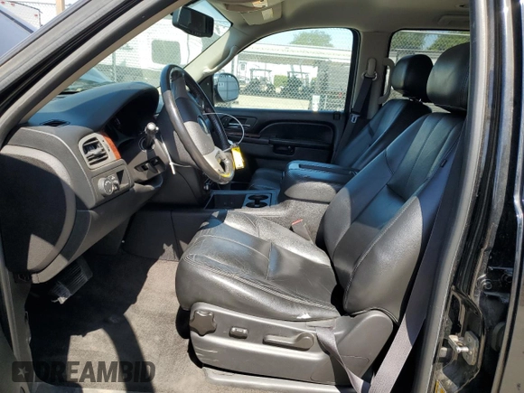 2014 Chevrolet Tahoe LT with VIN 1GNSCBE07ER115998, listed as a Copart auction lot 59577485 with 154,486 mi miles and Salvage title. Bid and sale history available at DreamBid. Image 7.