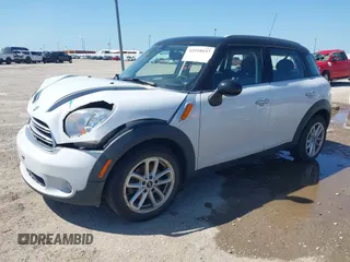 2015 MINI Countryman with VIN WMWZB3C55FWR43773, listed as a IAAI auction lot 42510137 with 150,764 mi miles and . Bid and sale history available at DreamBid. Image 2.
