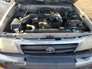 1999 Toyota Tacoma with VIN 4TAPM62N0XZ546880, listed as a Copart auction lot 88327105 with 234,164 mi miles and Salvage Title. Bid and sale history available at DreamBid. Image 12.