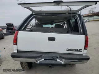 1999 Chevrolet Tahoe with VIN 3GNEK18R7XG230110, listed as a Copart auction lot 82932774 with 148,055 mi miles and Salvage Title. Bid and sale history available at carsss.com. Image 6.