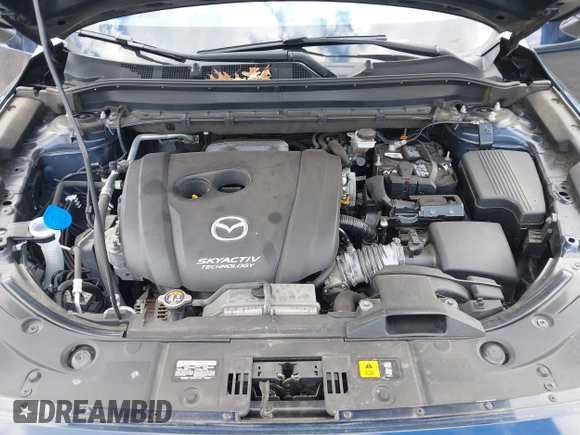 2019 Mazda CX-5 Grand Touring with VIN JM3KFBDM2K0603400, listed as a IAAI auction lot 42051135 with 59,448 mi miles and . Bid and sale history available at DreamBid. Image 10.