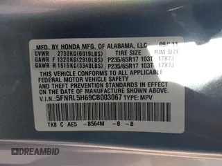 2012 Honda Odyssey EX-L with VIN 5FNRL5H69CB003067, listed as a IAAI auction lot 41862591 with 163,158 mi miles and . Bid and sale history available at carsss.com. Image 9.