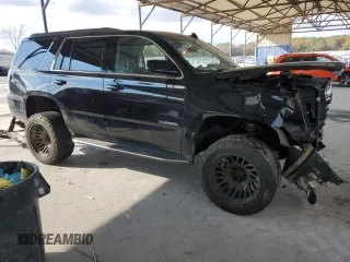 2019 GMC Yukon SLT with VIN 1GKS2BKCXKR108358, listed as a Copart auction lot 83765624 with 127,724 mi miles and Salvage Title. Bid and sale history available at carsss.com. Image 4.