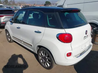 2014 FIAT 500L Lounge with VIN ZFBCFACH9EZ004041, listed as a IAAI auction lot 41366234 with 106,769 mi miles and . Bid and sale history available at DreamBid. Image 3.