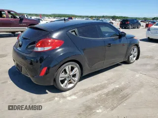 2016 Hyundai Veloster z VIN KMHTC6AD0GU266707, wystawiony jako Copart lot #57617395 z przebiegiem 70 677 mil mil oraz Szkoda całkowita • Salvage title. Historia ofert i sprzedaży dostępna na DreamBid. Obrazek 3.