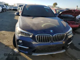 2017 BMW X1 sDrive28i with VIN WBXHU7C3XH5H37412, listed as a Copart auction lot 71733512 with 0 mi miles. Bid and sale history available at carsss.com. Image 5.