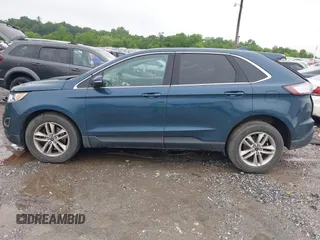 2016 Ford Edge SEL z VIN 2FMPK4J8XGBC48801, wystawiony jako IAAI lot #42274392 z przebiegiem 76 131 mil mil oraz . Historia ofert i sprzedaży dostępna na DreamBid. Obrazek 14.
