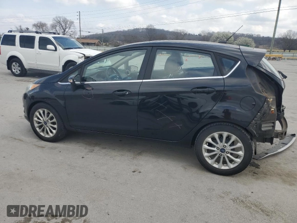 2017 Ford Fiesta Titanium with VIN 3FADP4FJXHM142648, listed as a Copart auction lot 48975125 with 82,042 mi miles and Salvage Title. Bid and sale history available at DreamBid. Image 2.