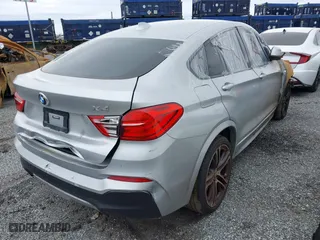 2016 BMW X4 xDrive28i with VIN 5UXXW3C55G0R20074, listed as a IAAI auction lot 42067204 with 91,169 mi miles. Bid and sale history available at carsss.com. Image 4.