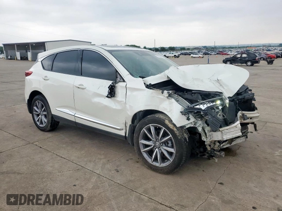 2019 Acura RDX Technology with VIN 5J8TC2H56KL001527, listed as a Copart auction lot 57758495 with 88,823 mi miles and Salvage title. Bid and sale history available at DreamBid. Image 4.