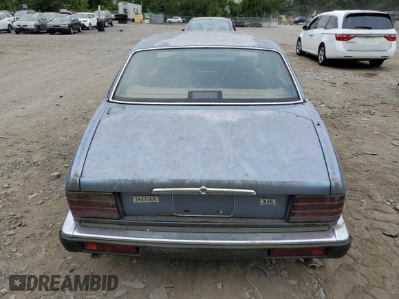 1989 Jaguar XJ with VIN SAJHY1540KC578115, listed as a Copart auction lot 69142274 with Not Provided miles and Clean Title. Bid and sale history available at DreamBid. Image 6.