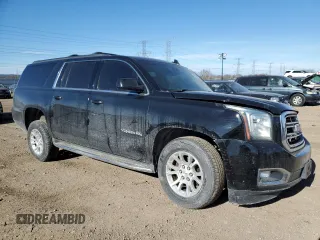 2015 GMC Yukon XL SLT with VIN 1GKS2HKC4FR631724, listed as a Copart auction lot 42298335 with 0 mi miles and Salvage Title. Bid and sale history available at carsss.com. Image 4.