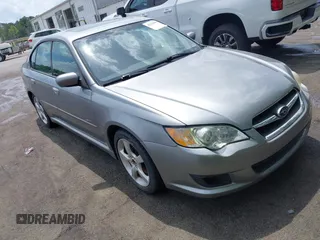 2009 Subaru Legacy Special Edition with VIN 4S3BL616197222590, listed as a IAAI auction lot 42132903 with 218,784 mi miles. Bid and sale history available at carsss.com. Image 1.