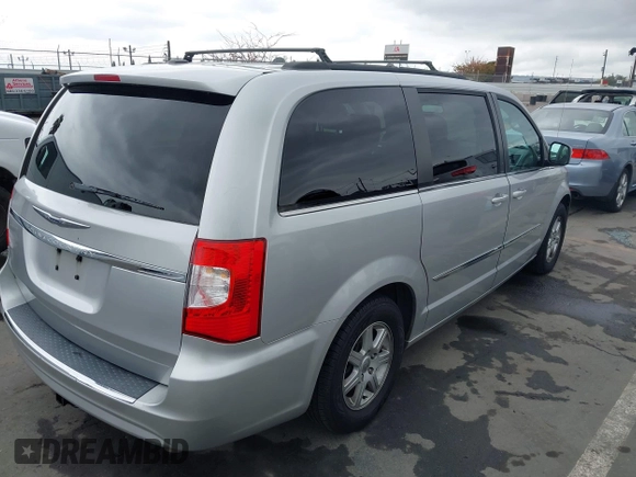 2011 Chrysler Town & Country Touring with VIN 2A4RR5DG2BR665177, listed as a IAAI auction lot 42213478 with 163,961 mi miles and . Bid and sale history available at DreamBid. Image 4.
