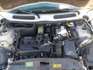 2003 MINI Hardtop with VIN WMWRC33433TE14150, listed as a IAAI auction lot 41313860 with 209,684 mi miles and . Bid and sale history available at DreamBid. Image 10.